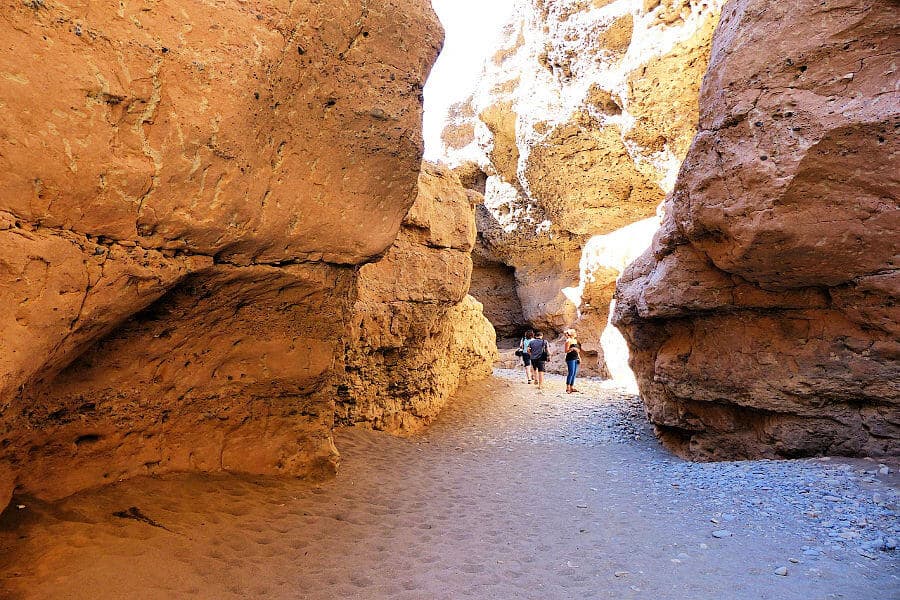 Narrow rock walls and winding path inside Sesriem Canyon near Sossusvlei