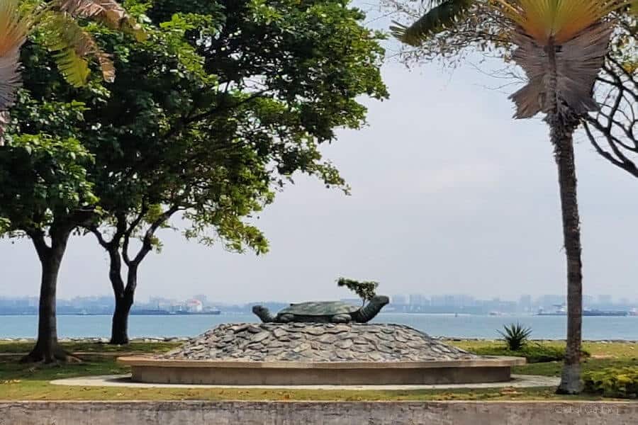 View of Singapore’s distant skyline across the water from Kusu Island