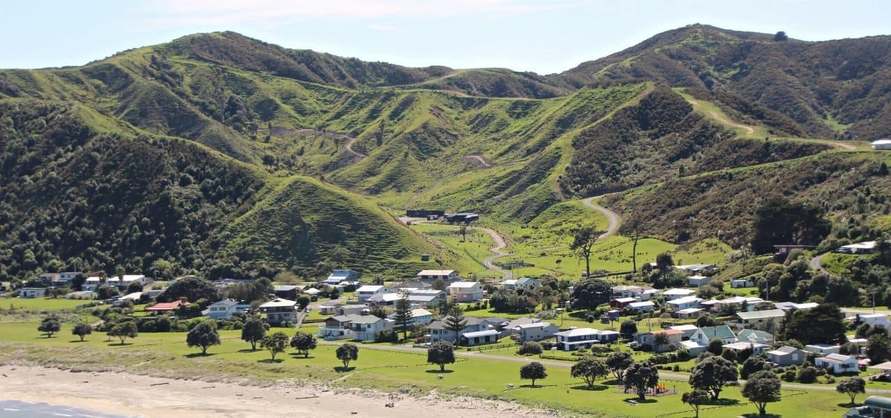 Mokotahi Hill overlooking the village of Mahia Beach on the Mahia Peninsula in New Zealand.