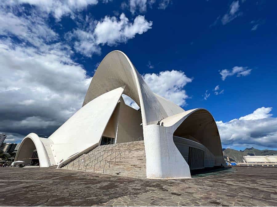 Auditorio de Tenerife in Santa Cruz de Tenerife with its white curved roof and blue sky.