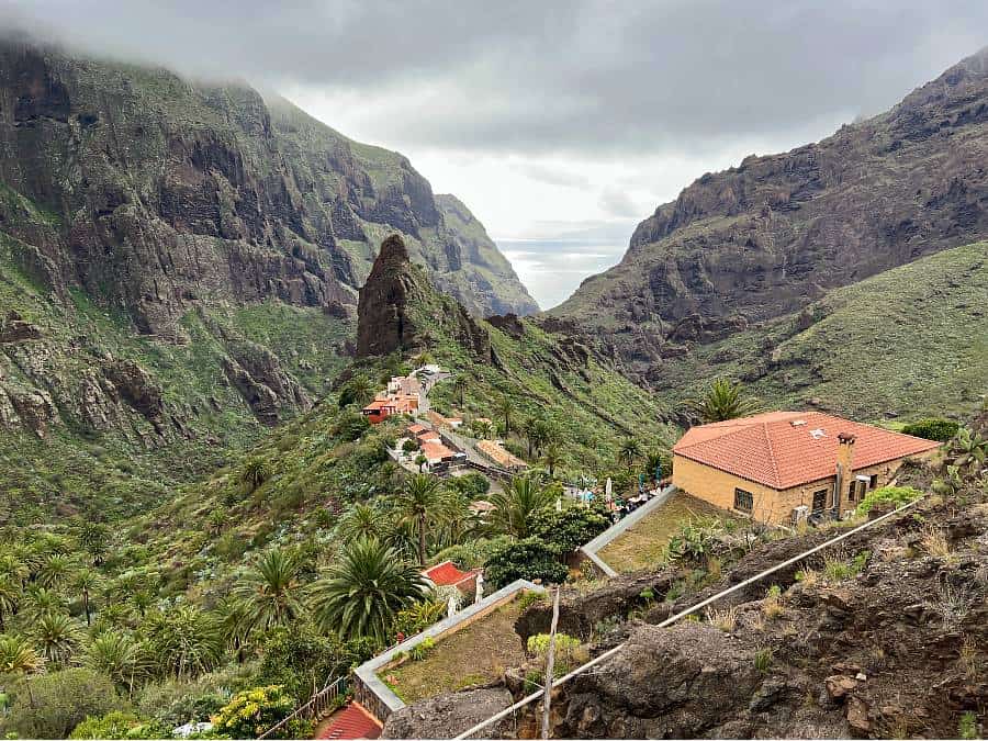 Masca village in Tenerife surrounded by steep green mountains and dramatic ravines.