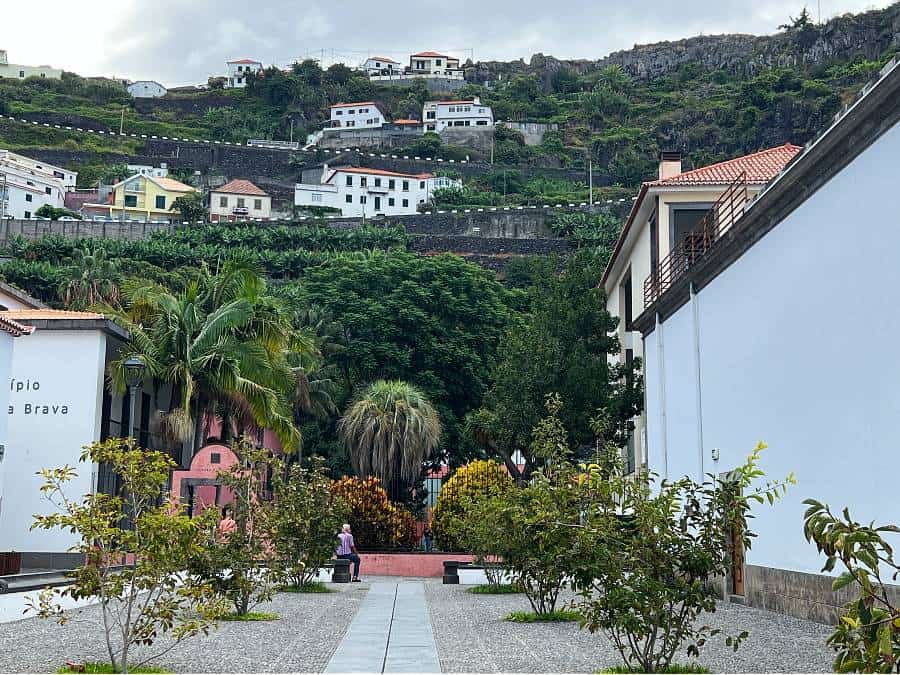 Ribeira Brava town centre with terraced hillsides and white houses climbing the green valley, Madeira