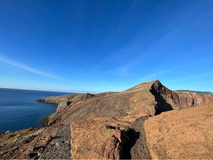Wide-angle view of Ponta de São Lourenço trail on Madeira with volcanic cliffs and ocean backdrop