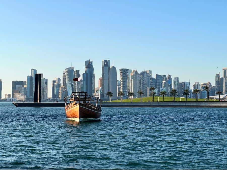 during one day in Doha walk along the corniche to view Doha skyline across the bay