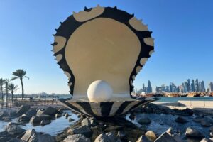Your Qatar Itinerary should include The Pearl Monument and Doha Skyline.