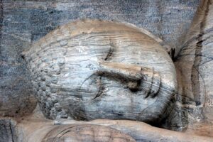 a reclining Buddha carved out of stone