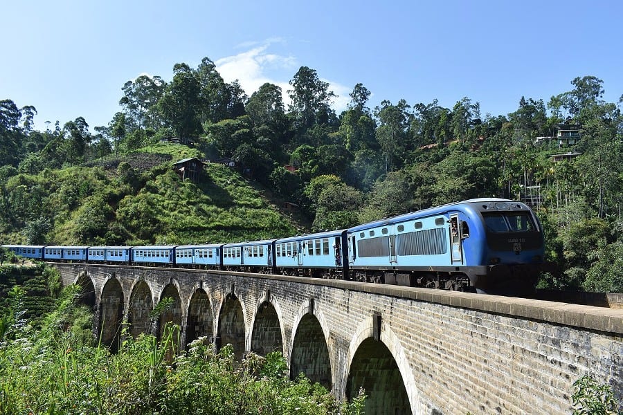 Blue train on a bridge in Sri Lanka