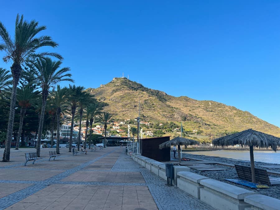 Machico promenade and beach with mountains behind, Madeira