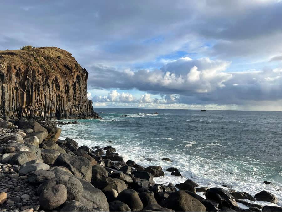 Rocky coastline and basalt cliffs on Madeira’s north coast, showing why travel times matter when deciding how many days in Madeira to plan
