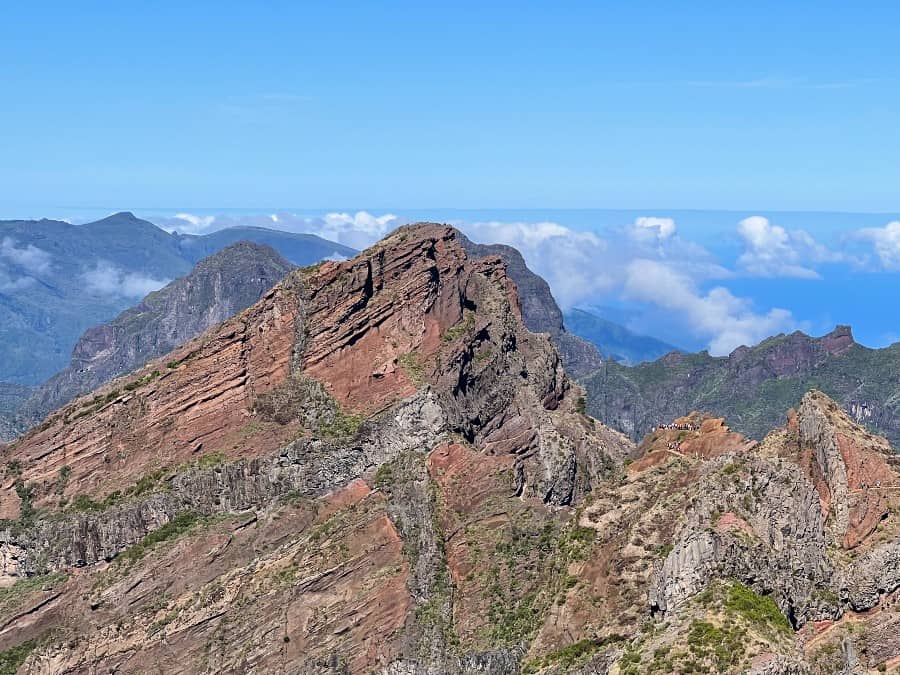 Mountain ridgeline view from Pico do Arieiro viewpoint in Madeira, Portugal.