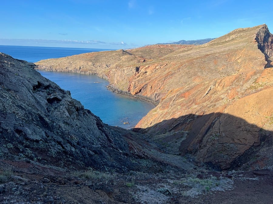 Rocky coastal cliffs and blue water on the Vereda da Ponta de São Lourenço hike, Madeira