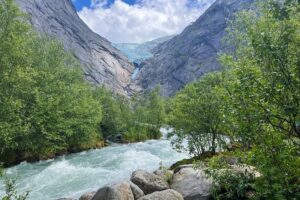 Briksdalsbreen glacier above the glacial lake in Norway
