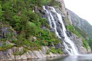 Hengjanefossen waterfall seen from the outdoor deck of a Lysefjord cruise